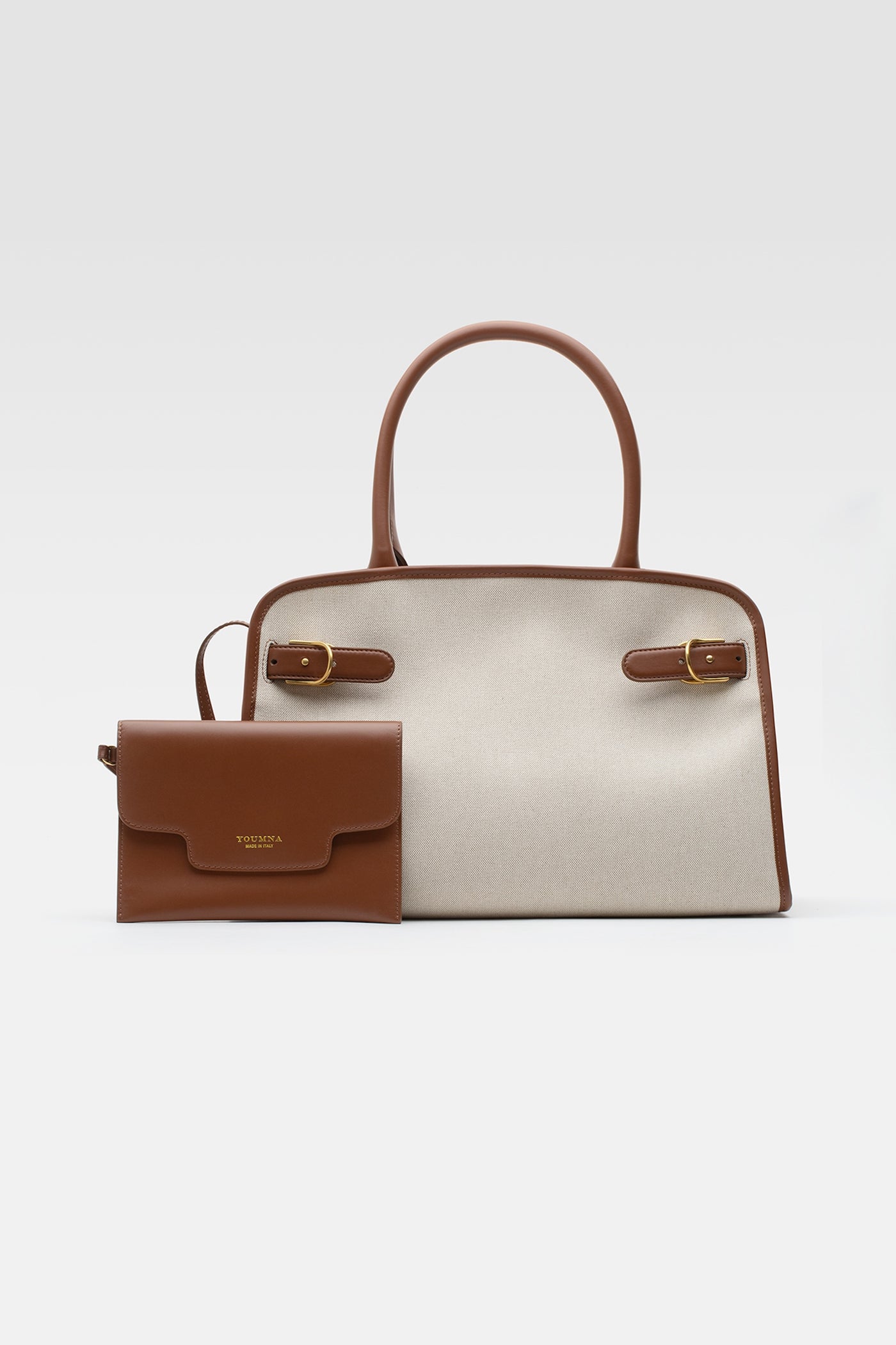 Medium handbag in cotton canvas with pochette in siena leather.