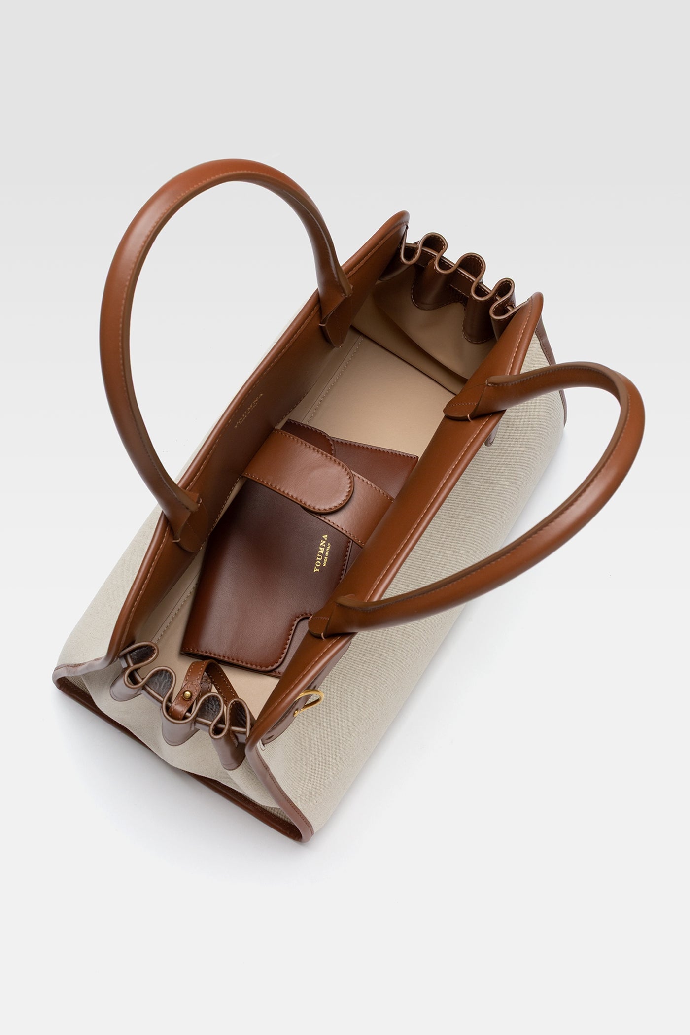 Medium handbag in cotton canvas with pochette in siena leather.