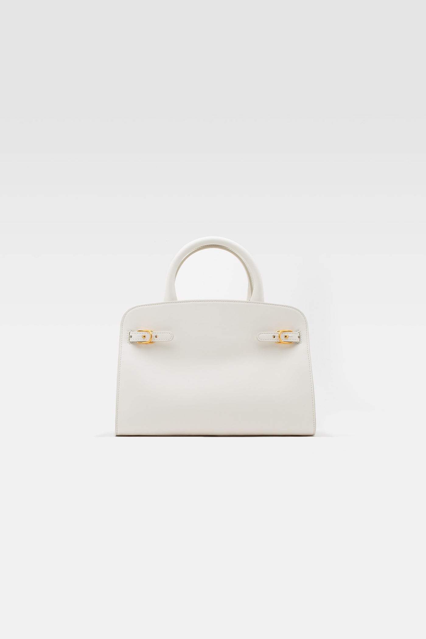 Medium handbag in milk leather with pochette in milk leather.