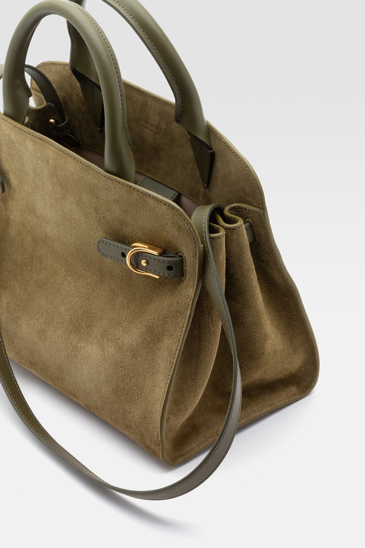 Medium handbag in suede with pochette in military green leather.