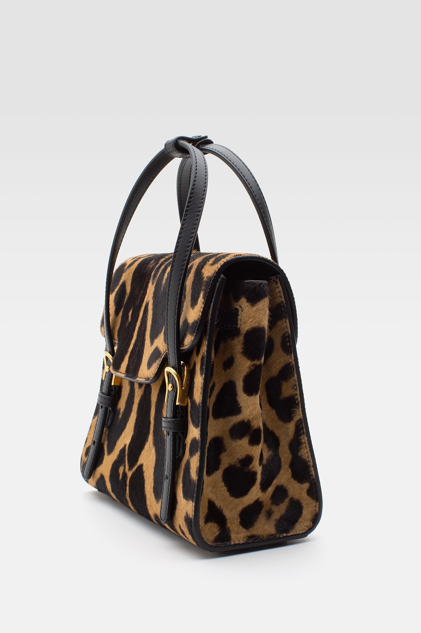 Flap bag in leo printed leather.