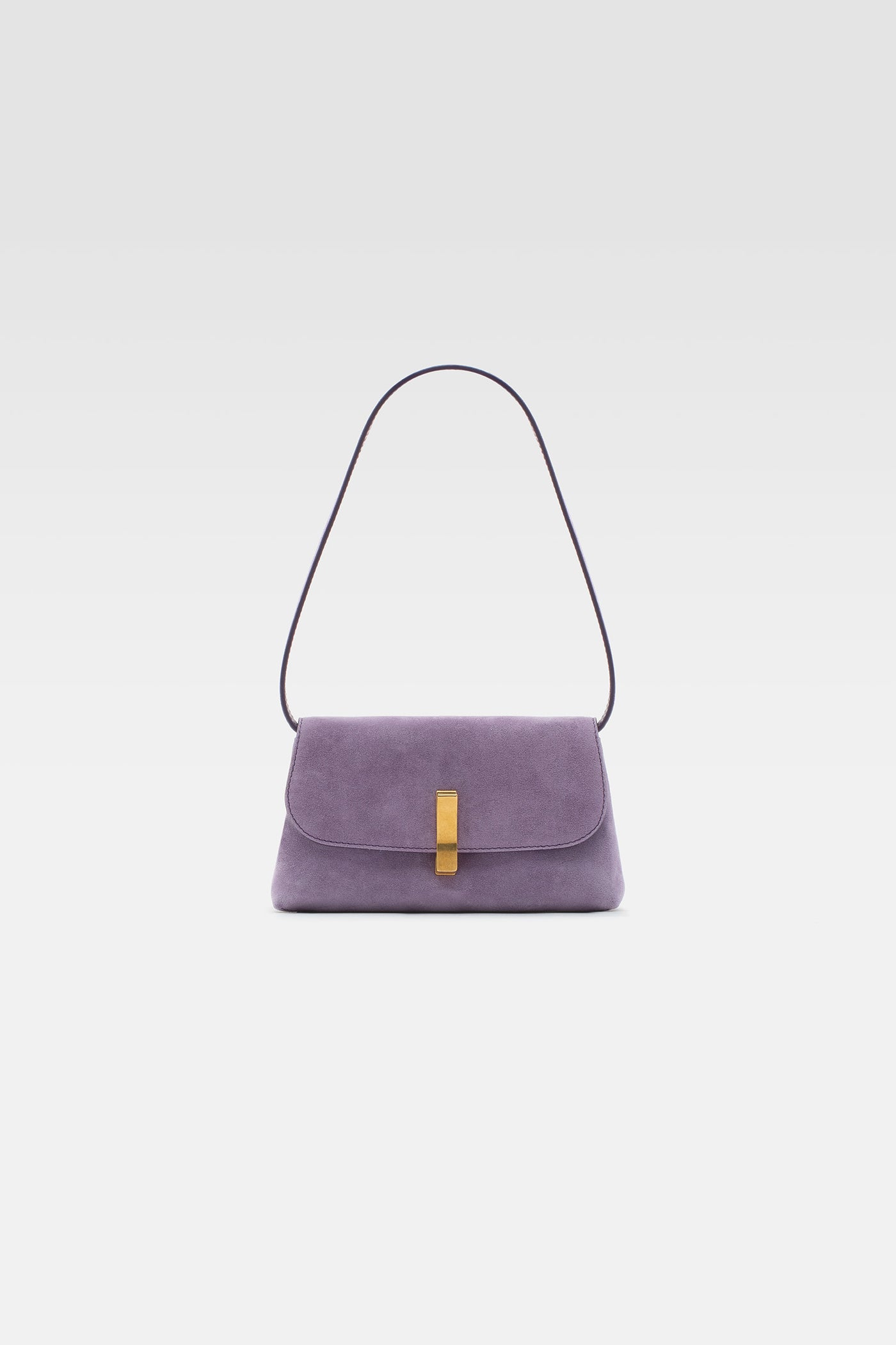 Mini shoulder bag in suede in lilac color.